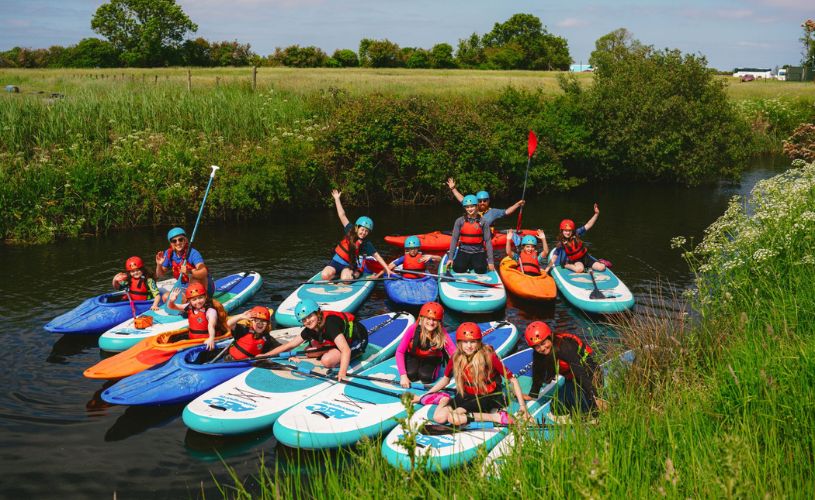 Paddlebaording group with Mendip Activity Centre